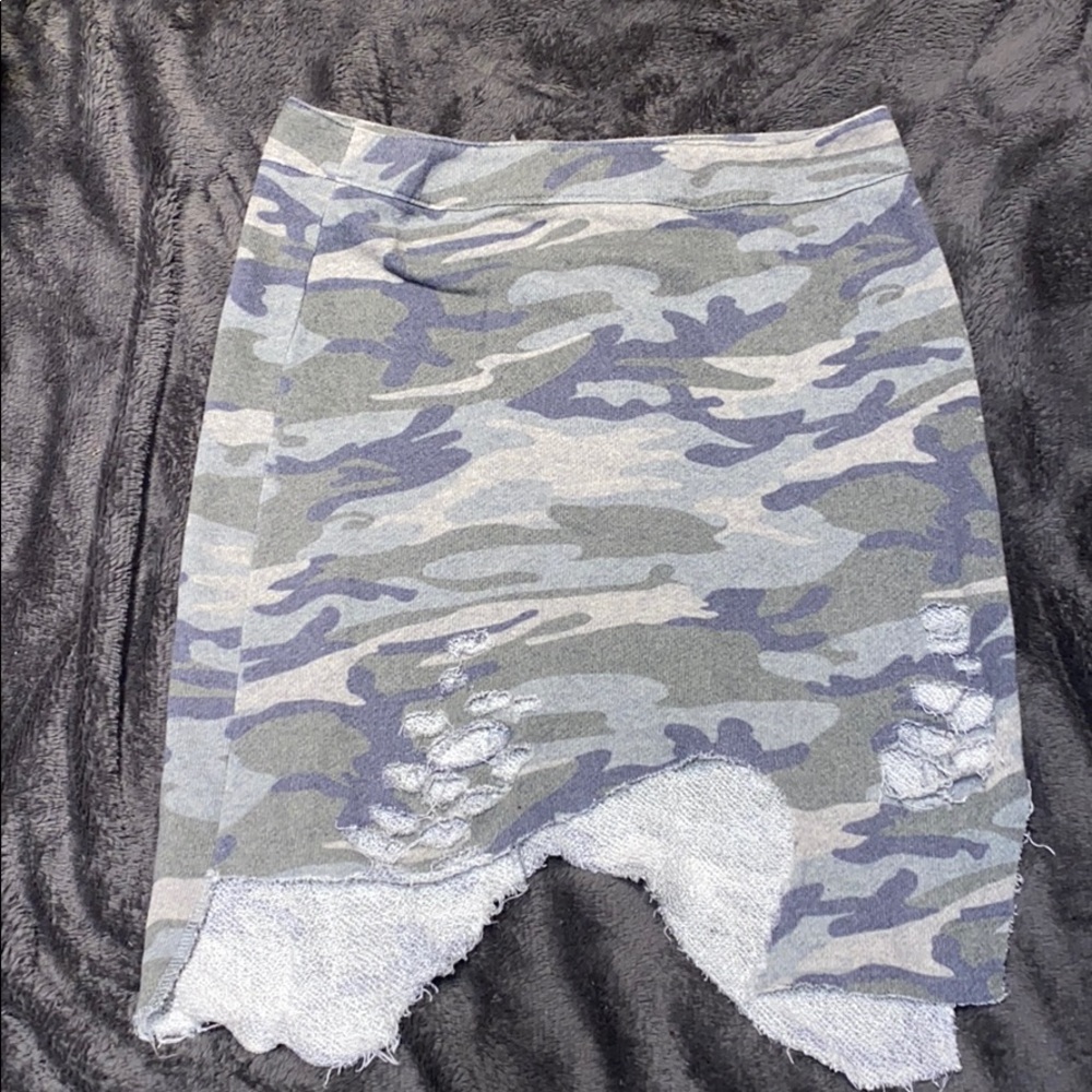 Distressed camouflage skirt